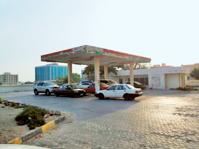 Umm Al Quwain petrol station closed for business, open for parking